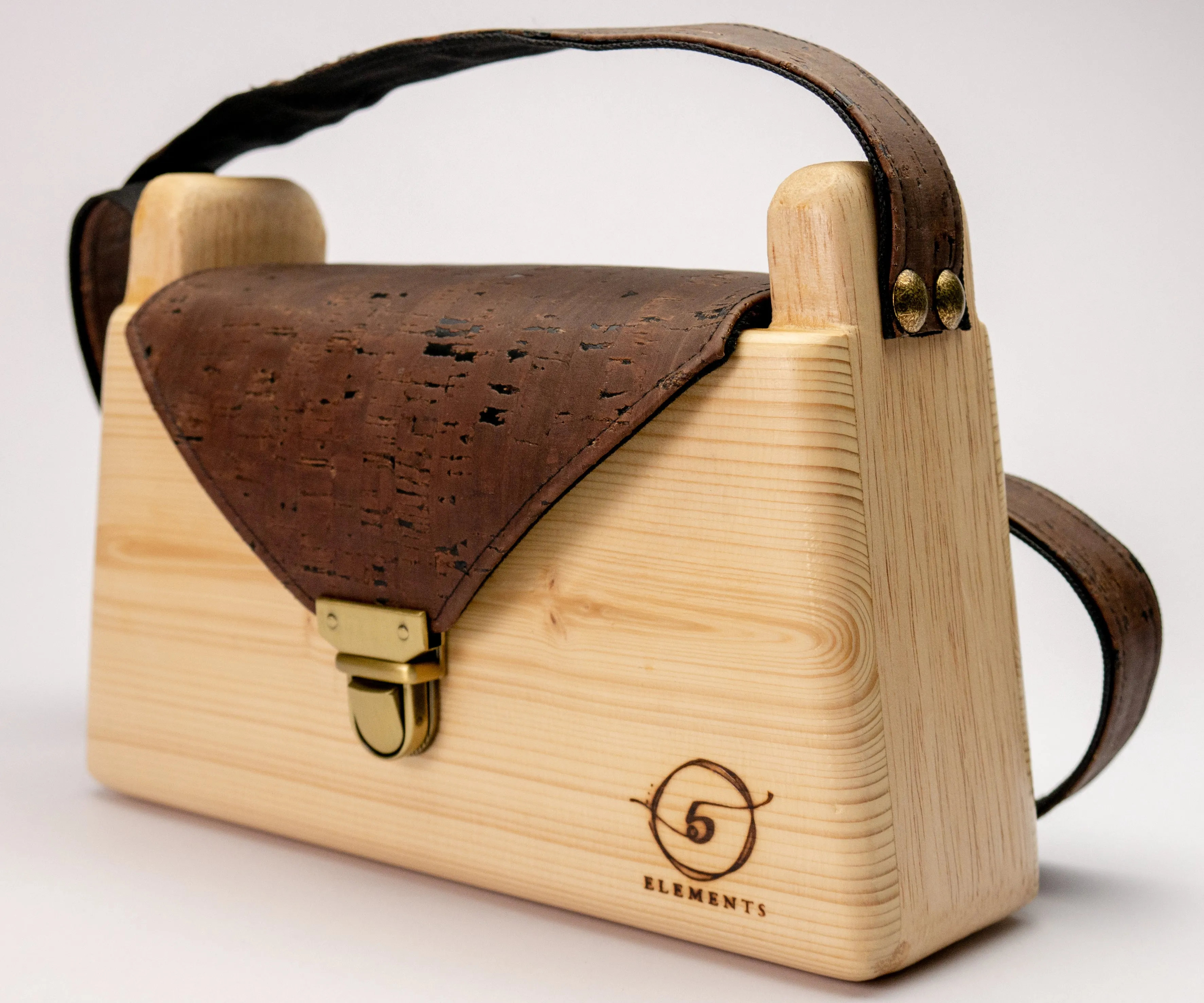 Wooden handmade shoulder bag with dark brown cork leather.